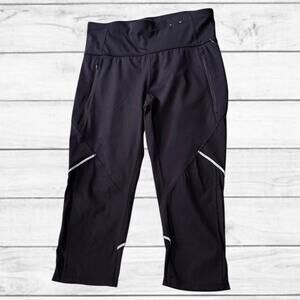 65. NWOT Xersion Quick Dry Black Capri Leggings With Zip Pockets Size Large